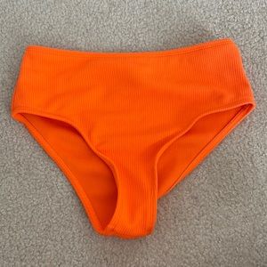 bright orange swimsuit bottems, hardly worn. high wasted. girls